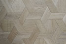 Parquet tapis hexagone en chêne, aspect naturel gris