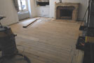 Note: existing baseboards are left in place and cut off in bottom to allow the passage of blades parquet.
