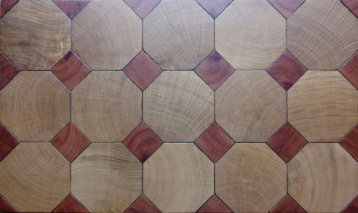 End grain Octagonal parquet floor in oak with cabochons in red wood