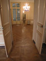 Le passage entre panneaux Versailles et parquet FougÃ¨res