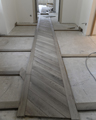 DÃ©but de la pose du parquet FougÃ¨re