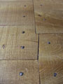 Gros plan sur ce parquet mÃ©diÃ©val