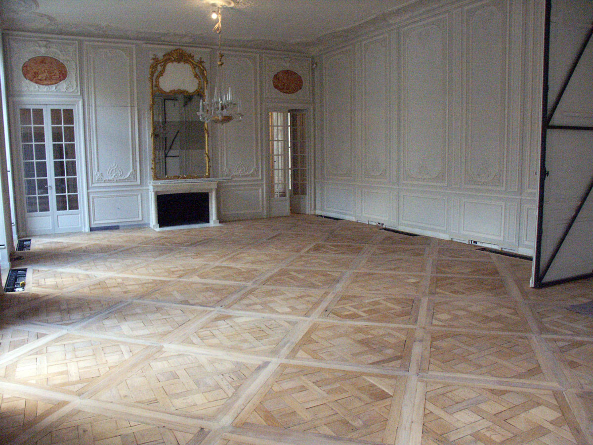 Vue d'ensemble d'une piÃ¨ce en parquet Versailles
